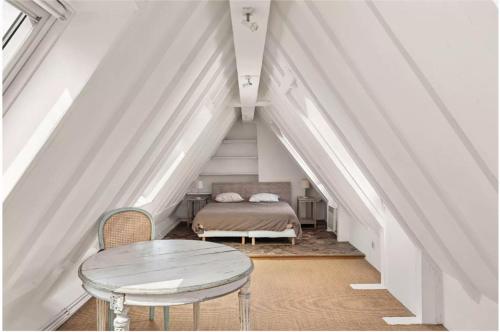 Duplex de charme au cœur du Marais