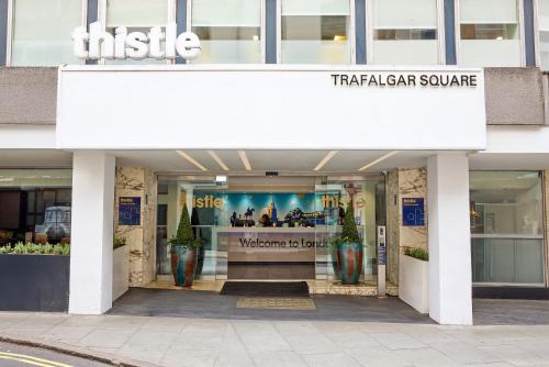 a store front of a shopping center with a sign at Thistle Trafalgar - Leicester Square in London