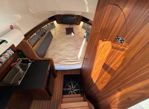 an overhead view of a small bed in a boat at Golden Yacht Solina in Polańczyk