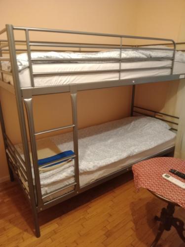 a couple of bunk beds in a room at Christos IIII in Asvestokhórion