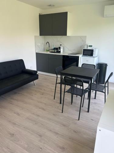 Petit Havre de Paix, Maisonnette contemporaine climatisée avec jardin privé