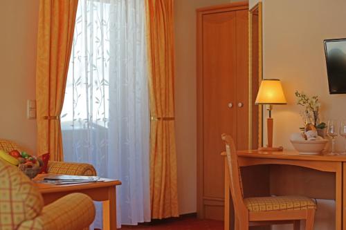 TV a/nebo společenská místnost v ubytování Hotel - Restaurant Gosauerhof