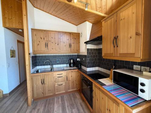 Appartement cosy aux Gets avec balcon et parking