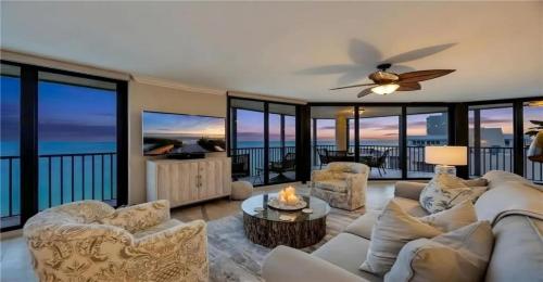 a living room with a view of the ocean at Oceanview Serenity Escape in Naples