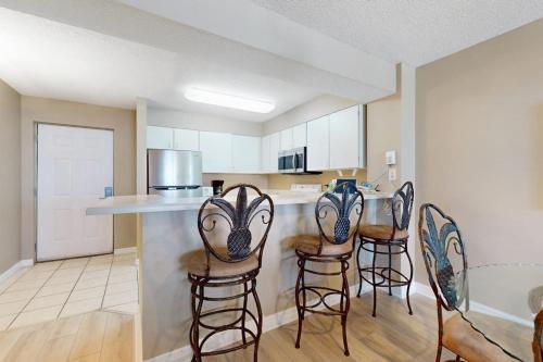 Beachfront with a heated pool & a spa photo 19