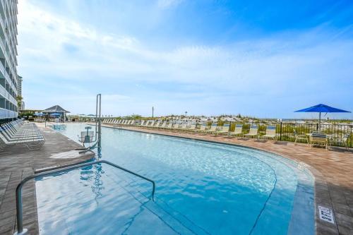 Beachfront with a heated pool & a spa photo 30
