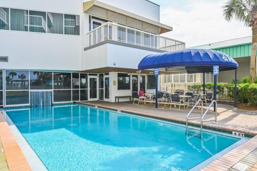 Beachfront with a heated pool & a spa photo 33