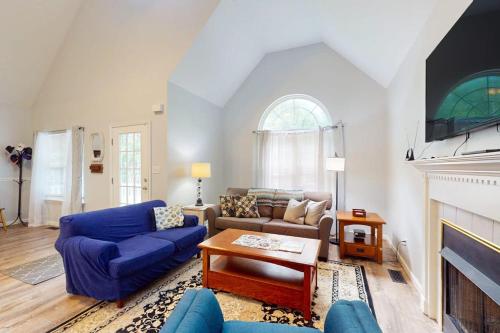 a living room with a couch and a fireplace at 37 Moonraker Road in Ocean Pines