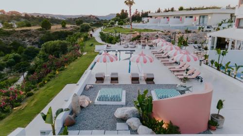 a view of the pool at the villa at The Palms Concept Hotel Adults Only 16 Plus in Faliraki