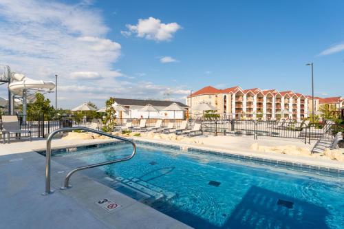 a swimming pool at a hotel with a resort at Carriage Place in Branson