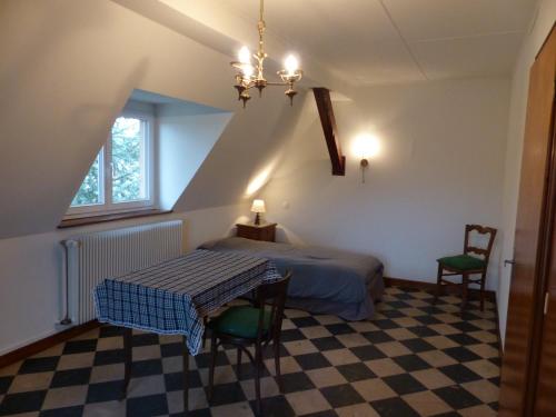 Posteľ alebo postele v izbe v ubytovaní Gîte du moulin