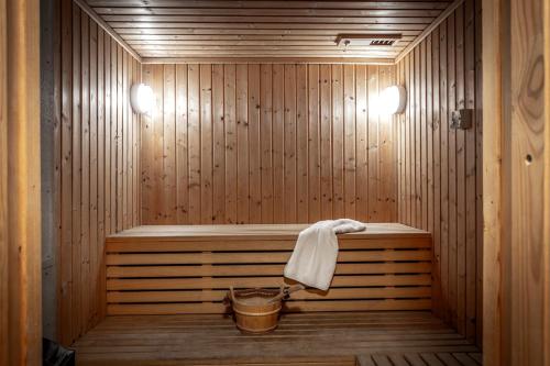 a sauna with a towel hanging on the side of it at Euronapa Hotel in Ayia Napa
