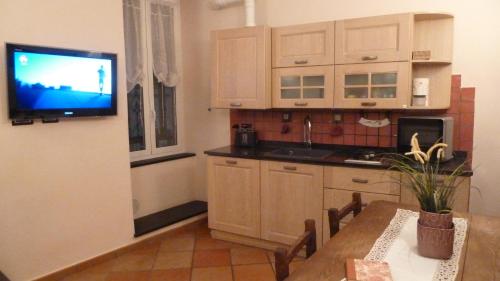Η κουζίνα ή μικρή κουζίνα στο Casa Orefici, 4 Apartments in front of Aquarium!