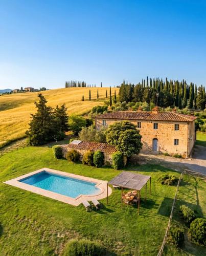 an aerial view of a house and a swimming pool at Chianti Escape PoolVines Tenuta Bibbiano-I Sodi in Castellina in Chianti