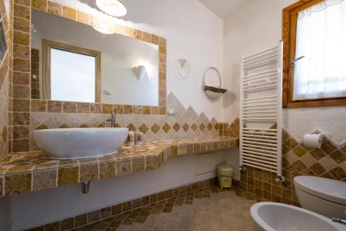 Ένα μπάνιο στο Casa La Liccia