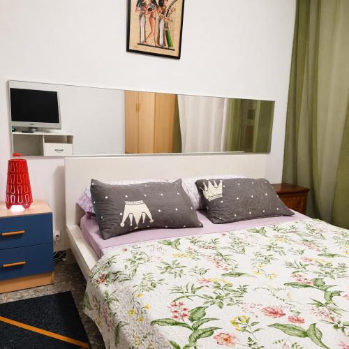 a bedroom with a bed with two pillows on it at habitacion 1 in Zaragoza