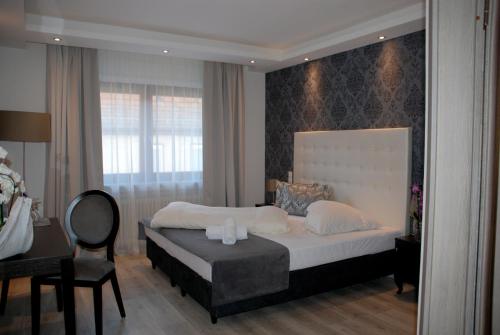 Postel nebo postele na pokoji v ubytování Hotel zur Linde