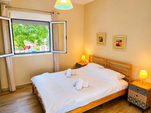 Voodi või voodid majutusasutuse Salamina Summer Nest toas