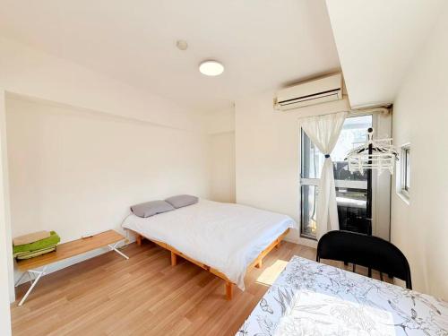 Shinjuku Kabuki Youth Hostel#New Sunshine Room#50 second walk from Higashi Shinjuku subway#Automatic locking door at entrance#新宿1