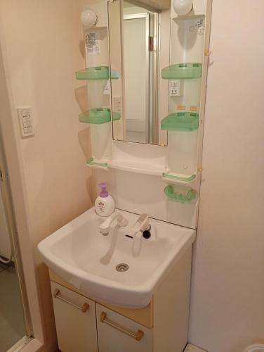 large room with 2double beds next to kuromon market