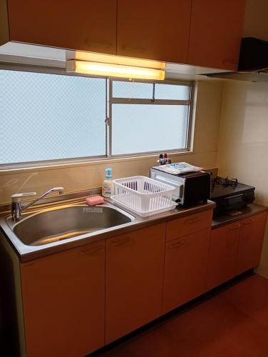 large room with 2double beds next to kuromon market