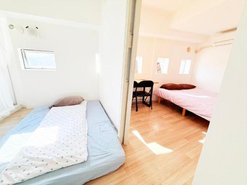 Shinjuku Kabuki Youth Hostel#New Sunshine Room#50 second walk from Higashi Shinjuku subway#Automatic locking door at entrance#新宿2