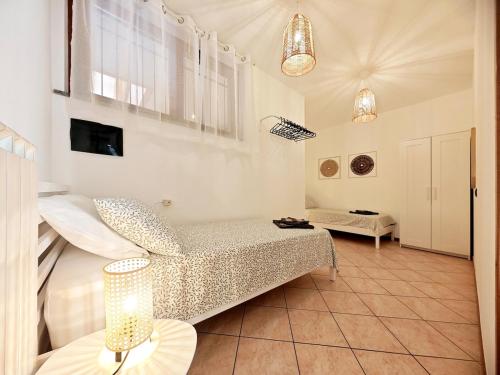 a living room with a bed and a couch at Route 600 in Intra