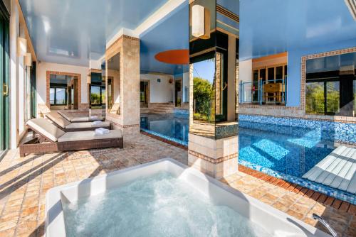 an image of a swimming pool in a house at Villa Spa Chiara Luna by Lago Reisen in Oggebio