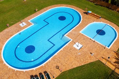 an overhead view of a swimming pool with the number two at Kampaoh Costa Brava in Pals