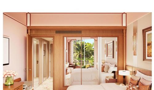 a room with a bed and a living room at Es Saadi Marrakech Resort - Hotel in Marrakesh