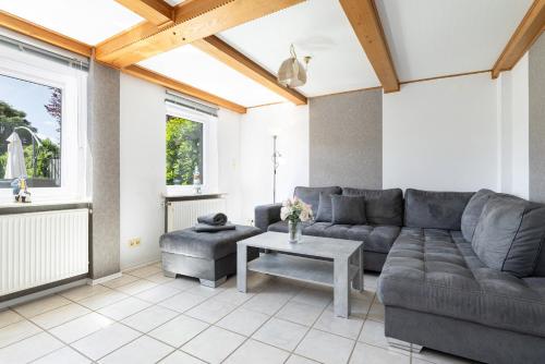 a living room with a couch and a table at Ferienhaus Neeb in Gammendorf