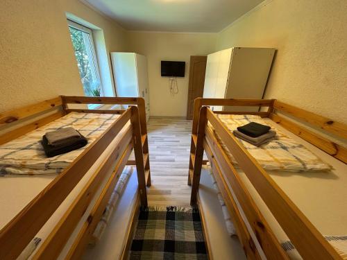 a room with two bunk beds in a room at Copa in Zeltweg