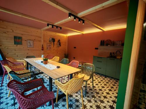 a dining room with a table and chairs at Vikendica Jagodica in Ivanjica