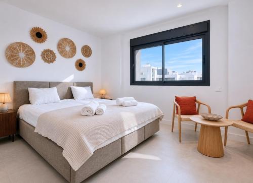 Elegant Estepona Retreat with terrace, pools & gym