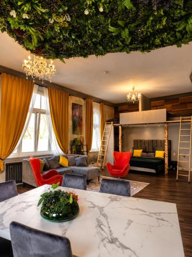 a living room with a couch and a bunk bed at Aue Stay in Kassel