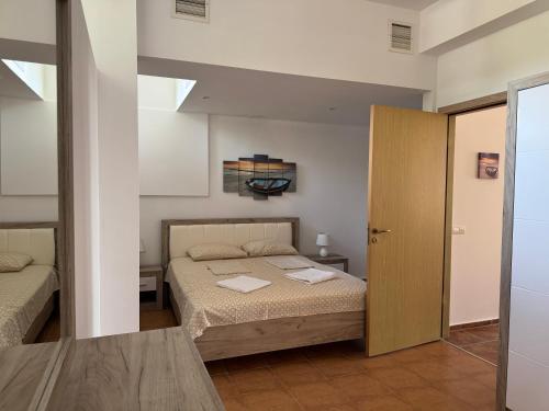 a bedroom with a bed in a room at VP Bellevue in Ravda