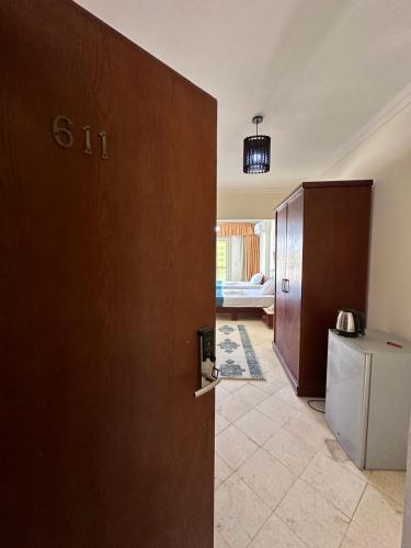 an open door to a room with a living room at Bianco Matrouh Hotel in Marsa Matruh