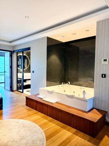 a large bathroom with a large tub in a room at Cityloft 175 in Istanbul