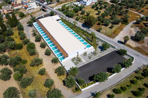 an overhead view of a building with a pool at Neya Elements in Lartos