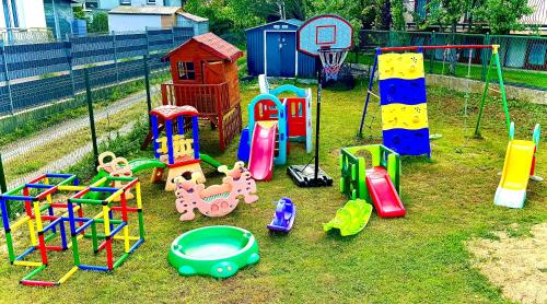 a playground with many different types of play equipment at Pensjonat Semida in Władysławowo