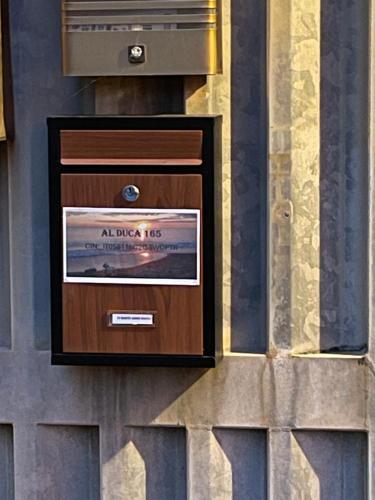 a box on the side of a building at Al Duca 165 in Ladispoli