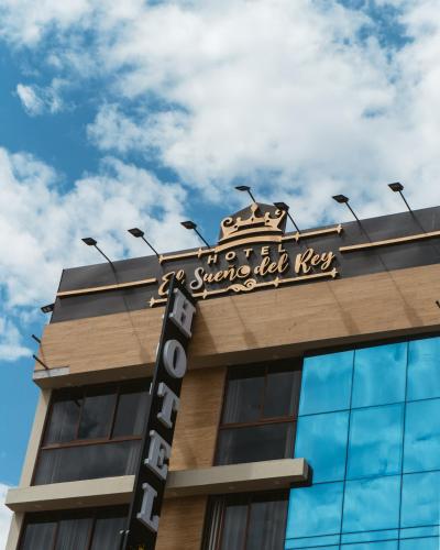 a building with a sign on top of it at El Sueño Del Rey in Majes