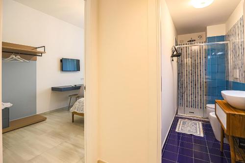 a bathroom with a toilet and a sink at Donna Maria Apartments - Amami Collection in Amalfi