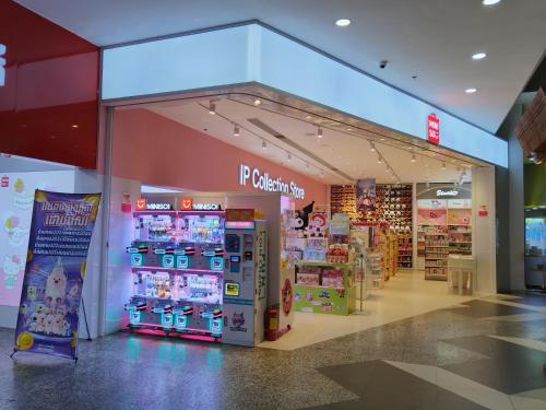 a store with two vending machines in a mall at Monica's house in Phnom Penh