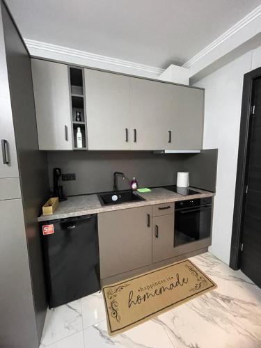 Moustakas Apartment 107
