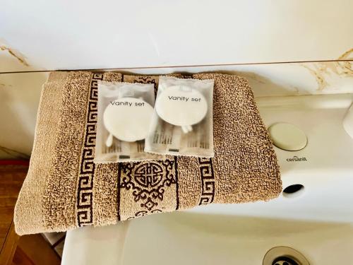 a towel hanging on the top of a stove at Penzión Tyché in Šurany