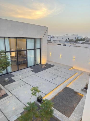 a large building with a view of the ocean at Hummingbird Dubai in Dubai