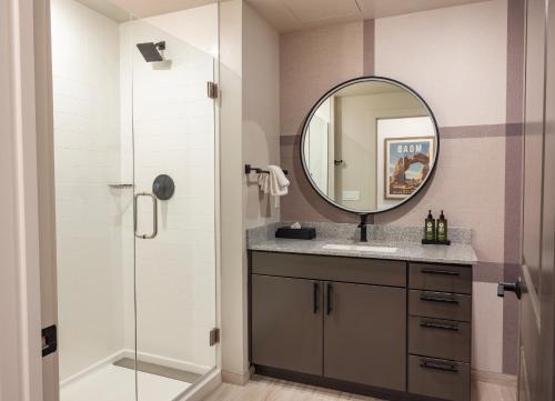 a bathroom with a sink and a mirror at EBAC Moab in Moab