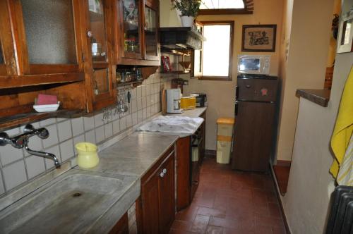 Кухня или мини-кухня в Casa della Madonna
