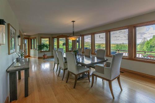 a dining room with a table and chairs at Valley View in Stowe